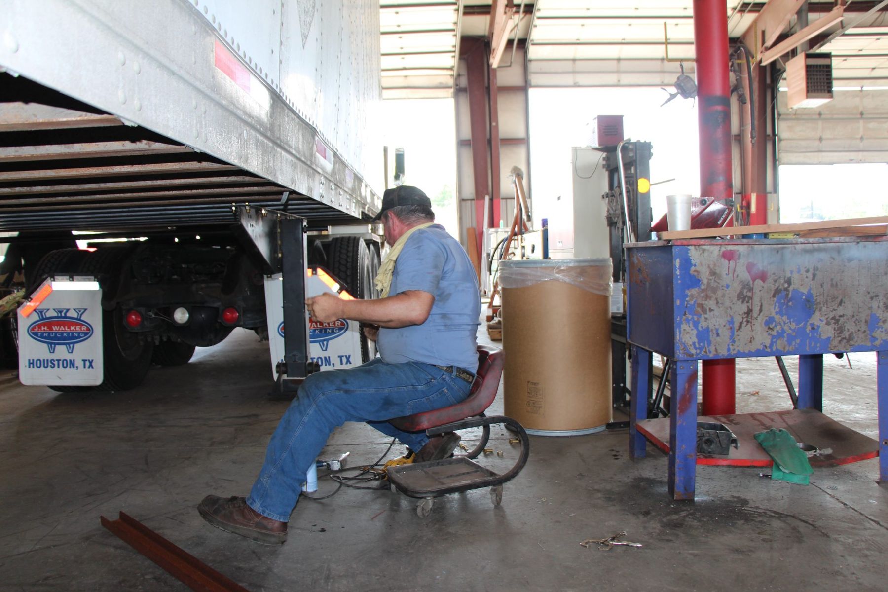 Mechanic servicing a truck in Superior's shop